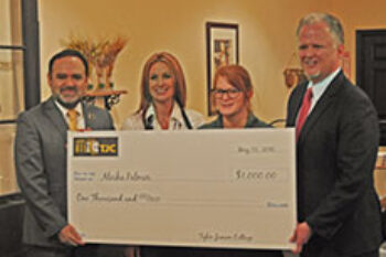 Restaurant staffer receives matching gift from TJC