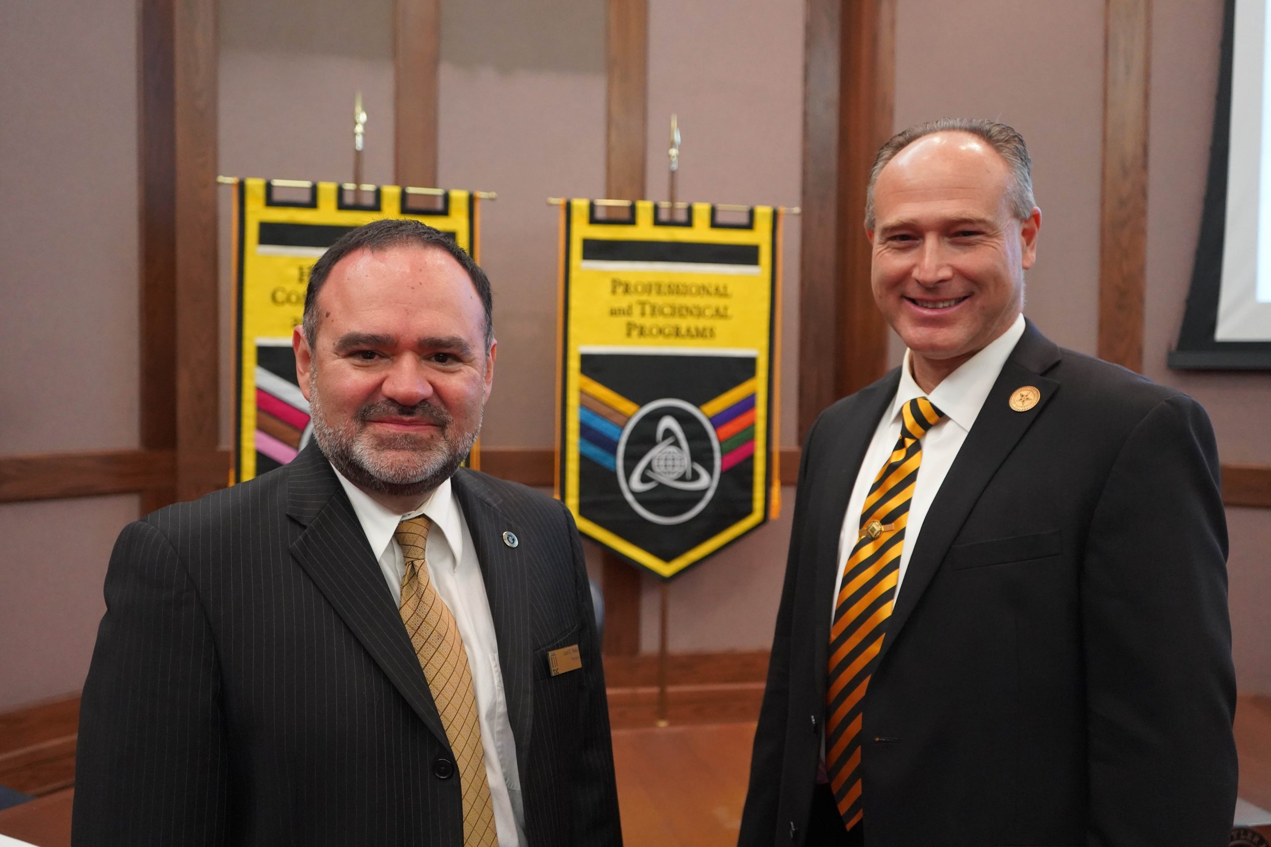 TJC president Juan E Mejia with Weatherford College president Tod Allen Farmer