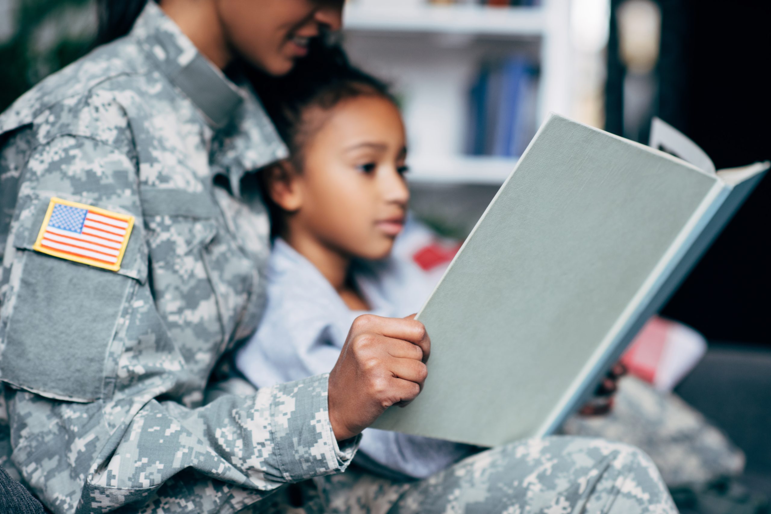 Cropped,View,Of,African,American,Daughter,And,Mother,In,Military