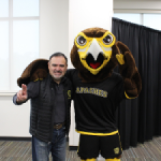 Harry the Hawk with a fan