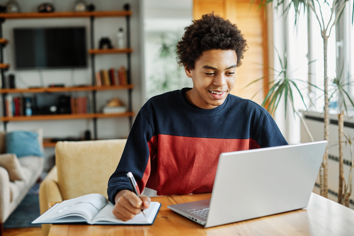 Education laptop student computer teenager studying boy learning homework study young school teenage black technology happy internet sitting college online man notebook using