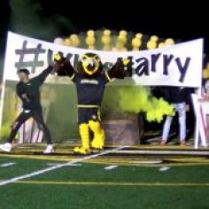 Tjc harry breaking through banner